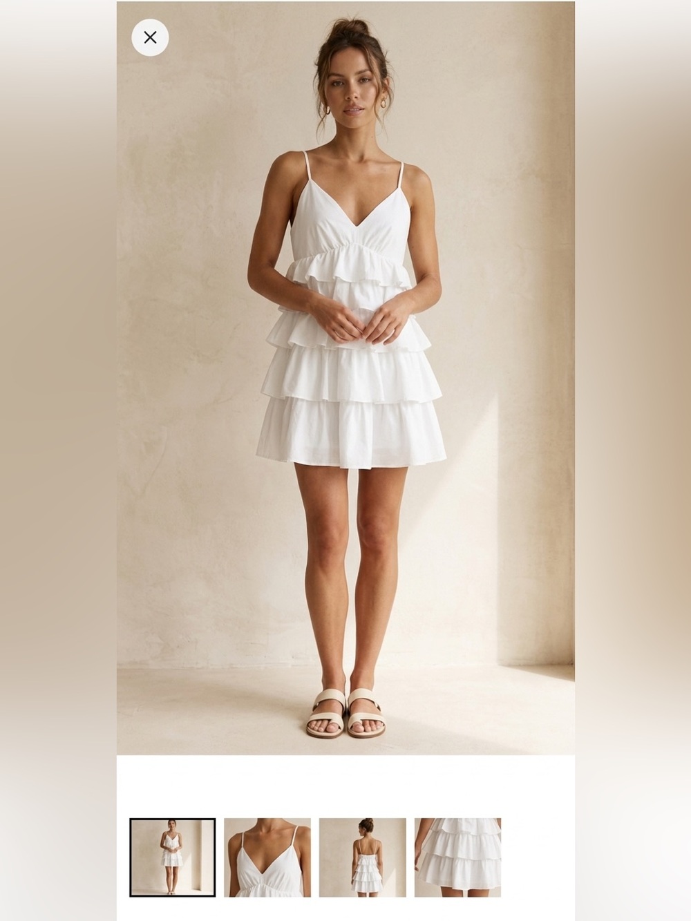 Entro white mini dress with ruffles and straps
White Tiered Spaghetti Strap